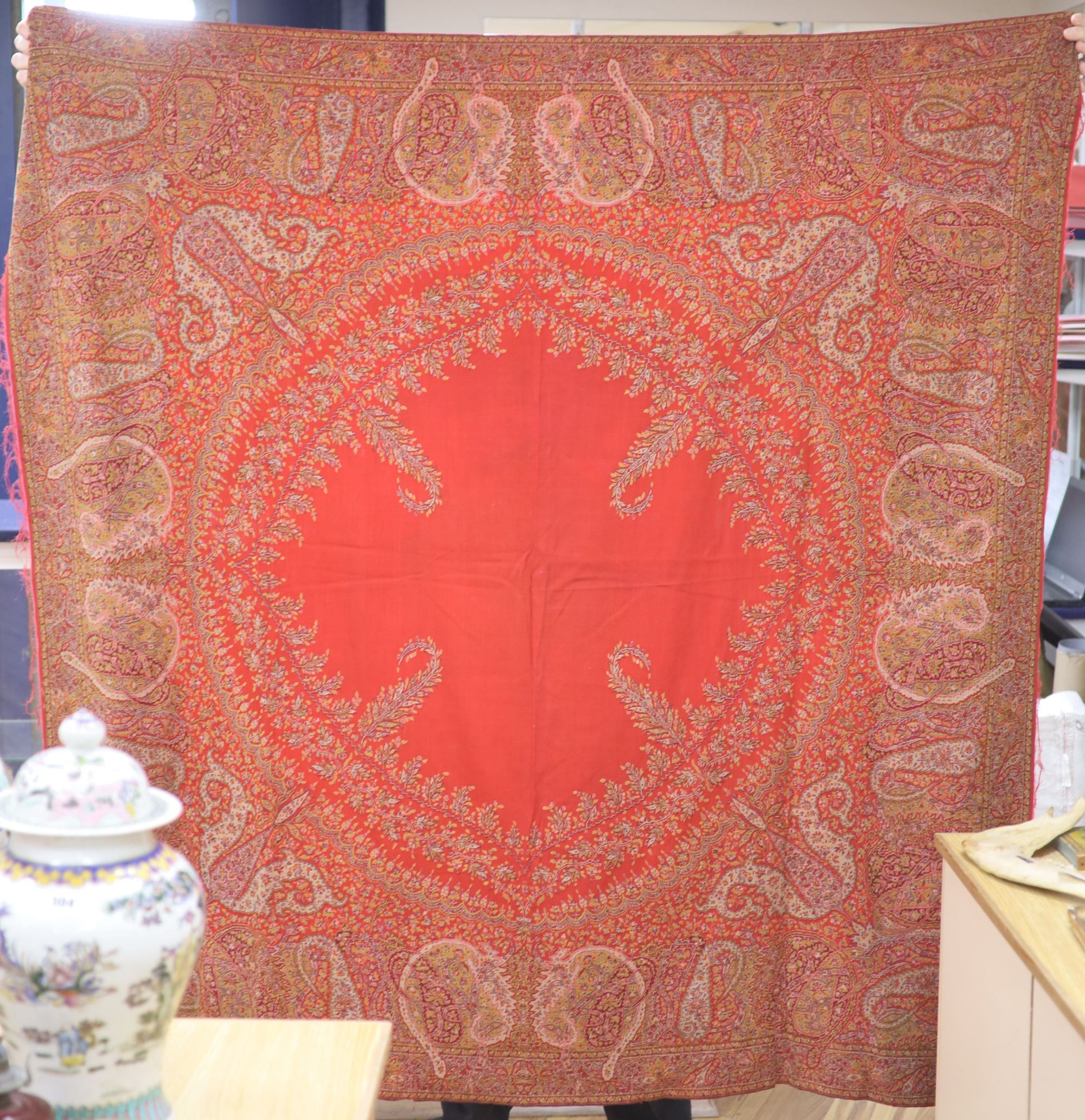 A 19th century Paisley shawl and two part Paisley shawls